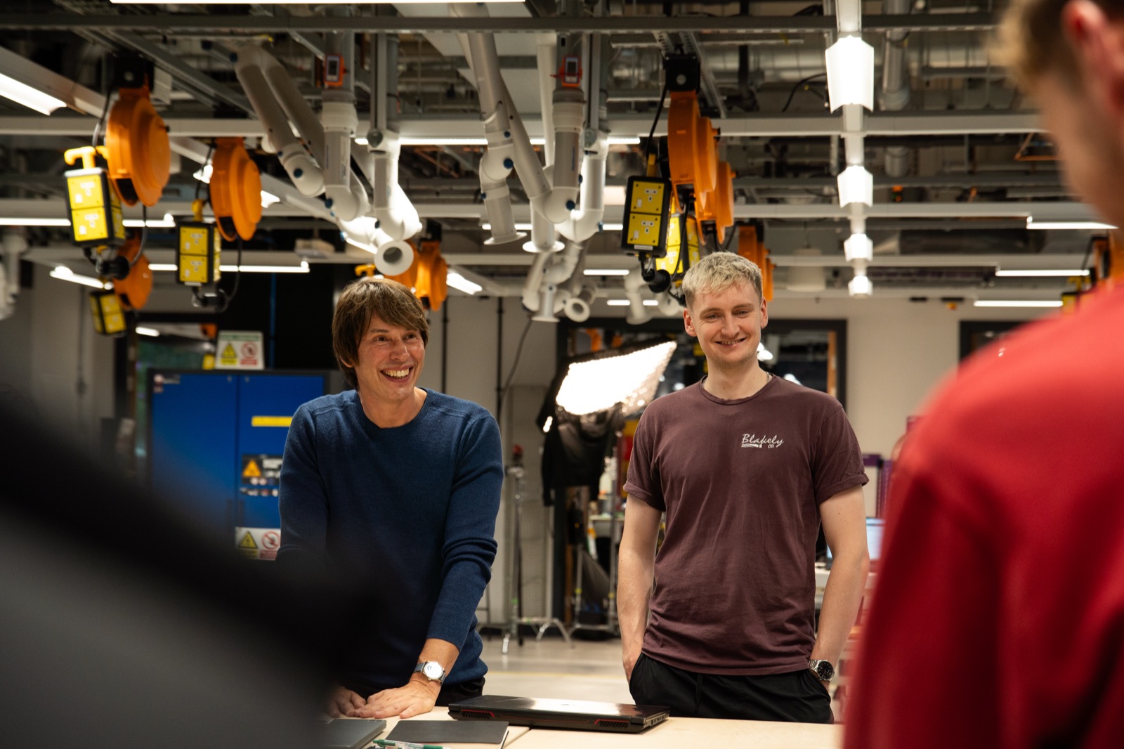 Ross Jenkinson with Prof. Brian Cox in the lab